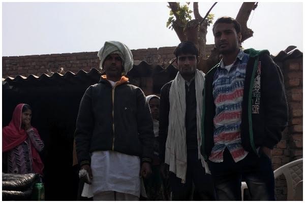 Shri Kishen (wearing headgear) with his family members